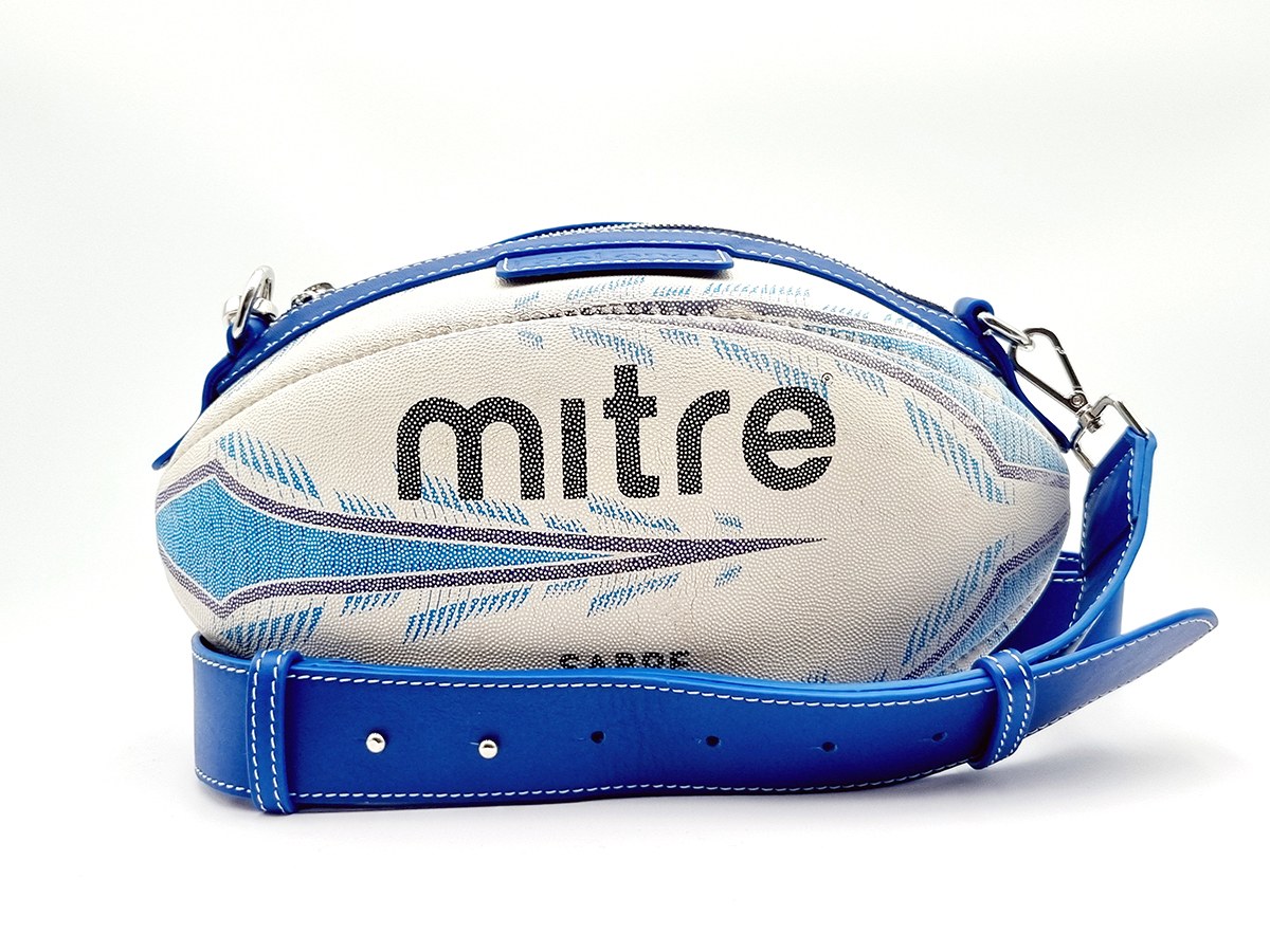 Bolso BallToBag rugby / azul: La silueta del rugby, con acabados en azul y blanco.